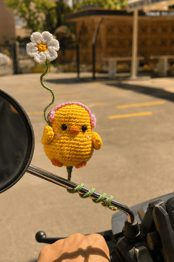 Chick with daisy scooty charm